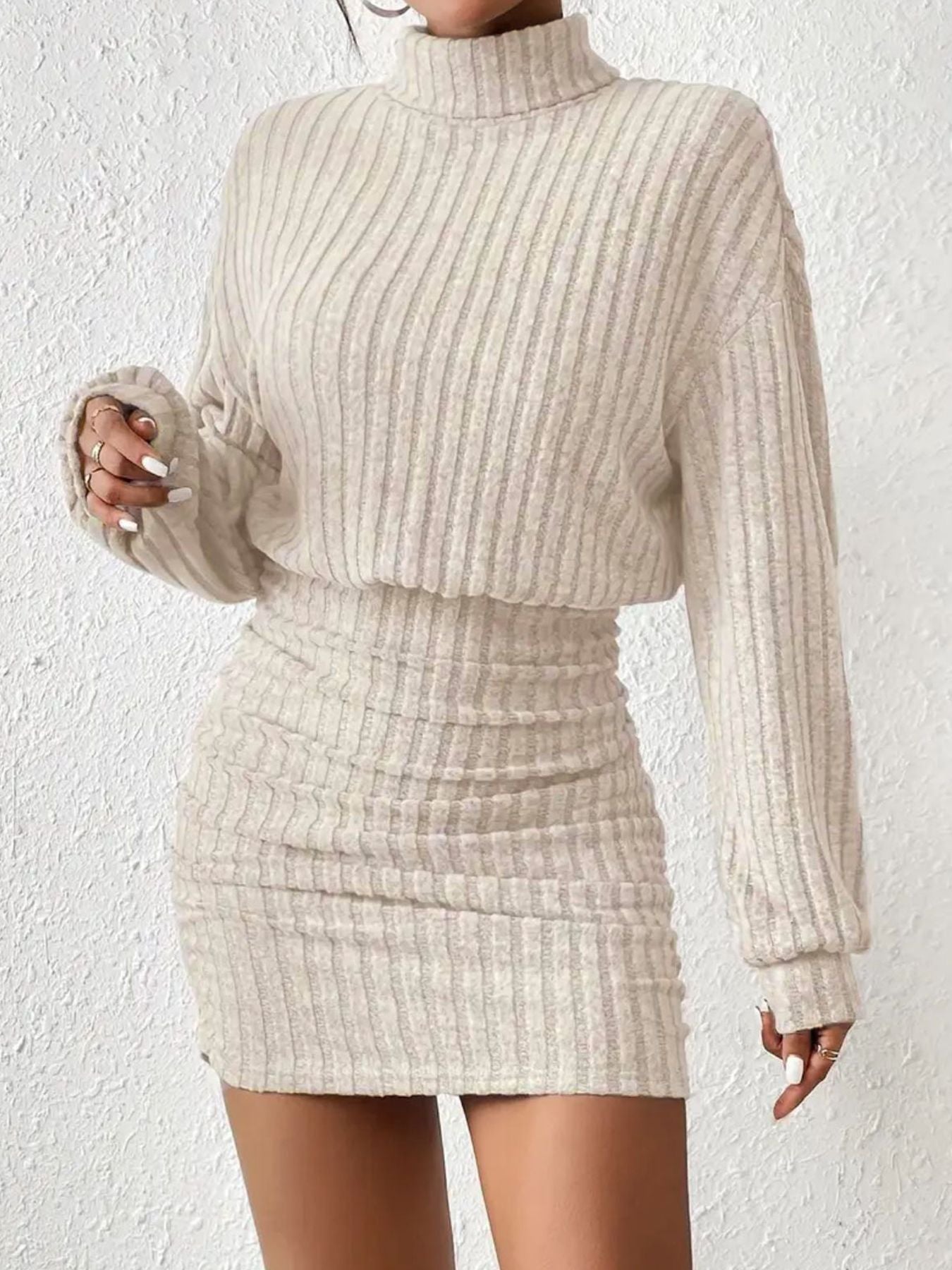 Ribbed knitted turtleneck mini dress with long sleeves and a slim, body-hugging silhouette for women