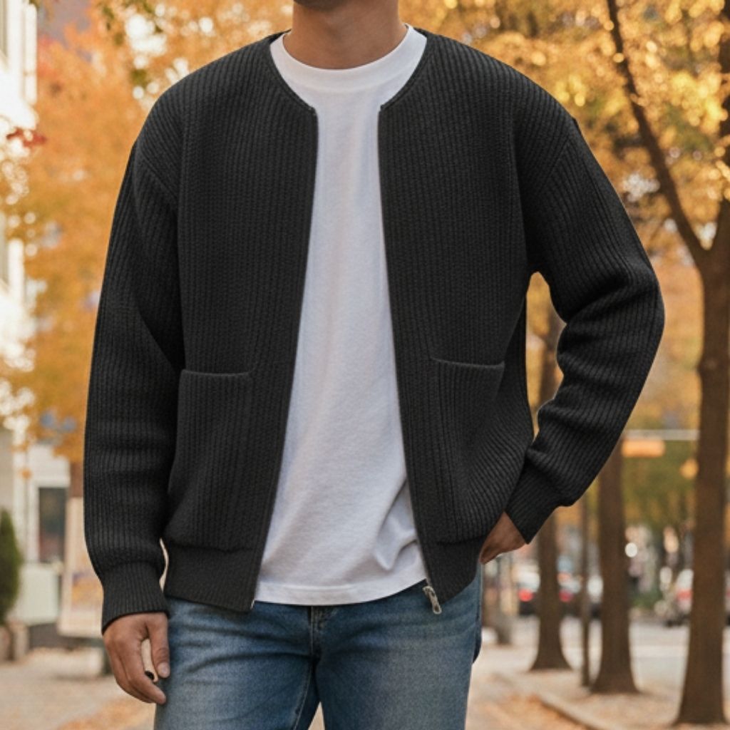 Close-up of men's ribbed knit zip cardigan showing zipper detail and structured knit texture