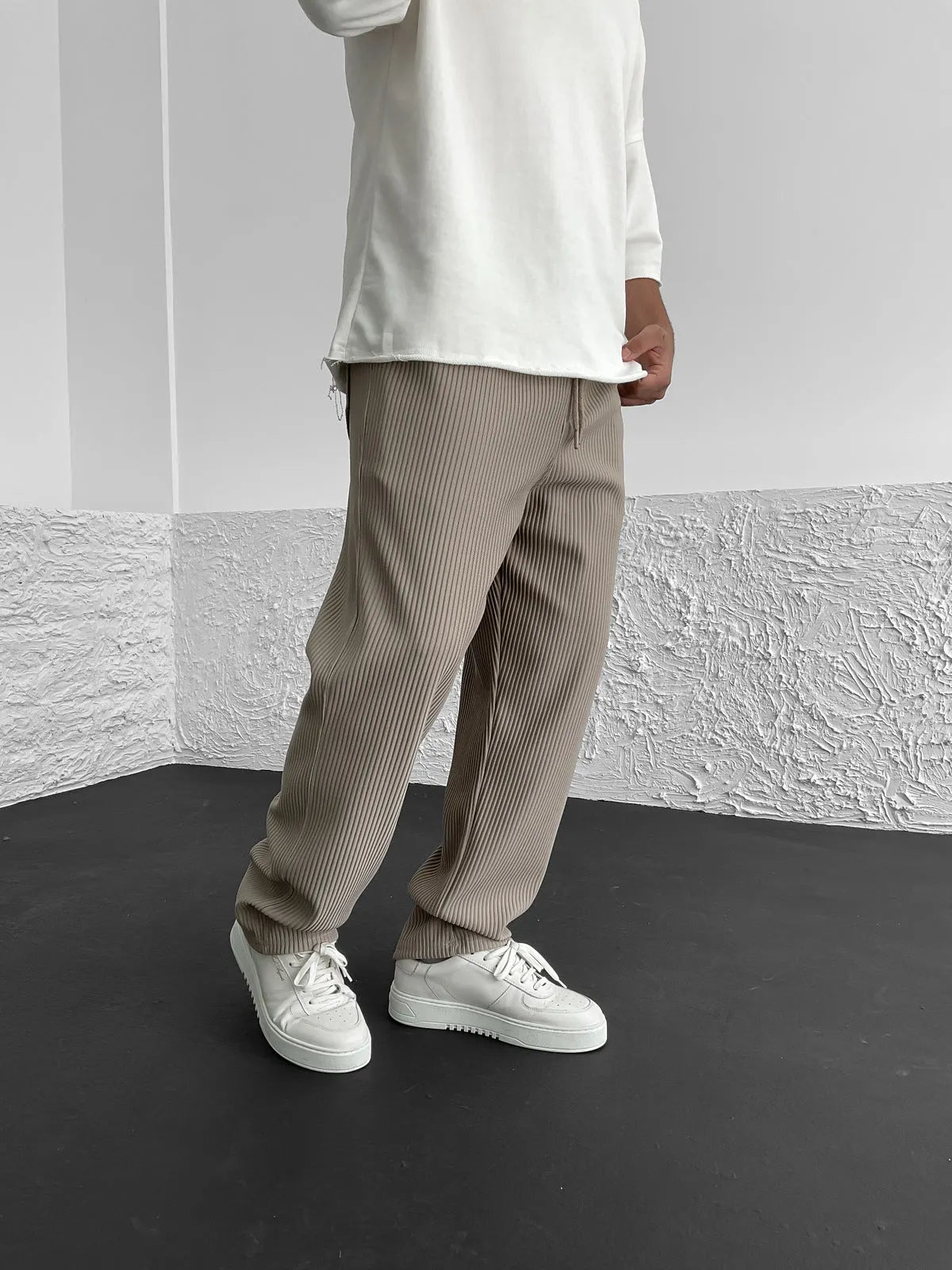 Corduroy trousers relaxed fit for men — back view showing back pockets