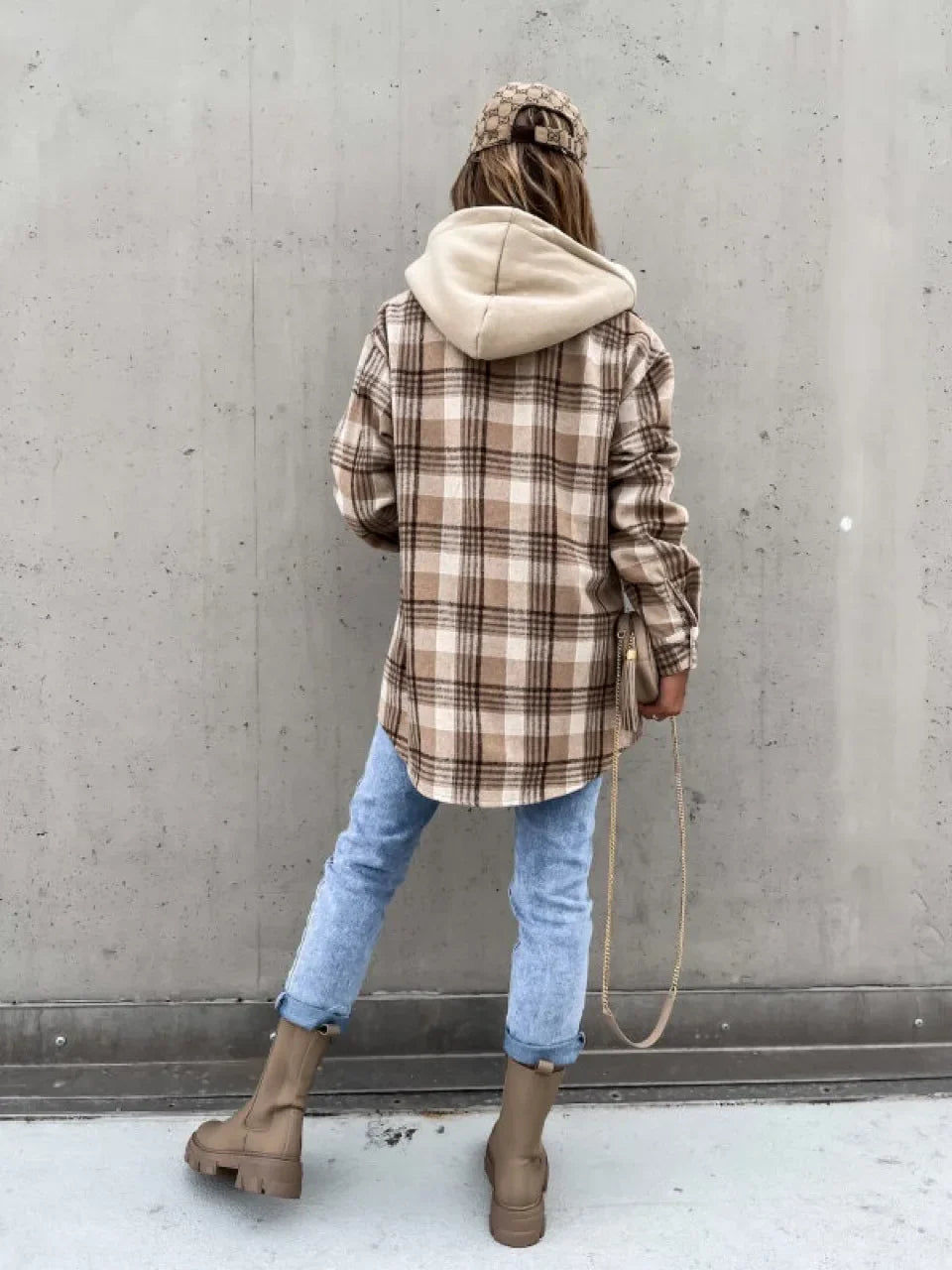 Women's relaxed-fit plaid jacket with front button placket, hip-length silhouette, side view