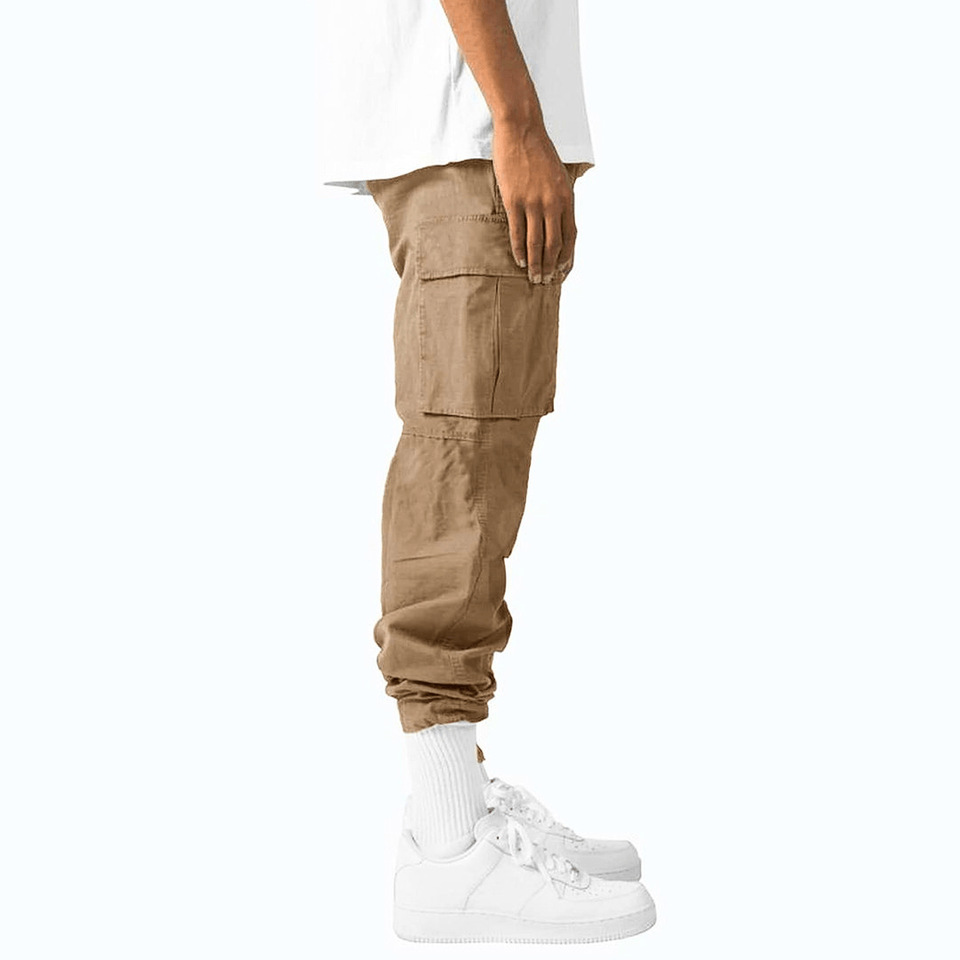 Detail shot of men's cargo trousers showing reinforced seams and pocket stitching