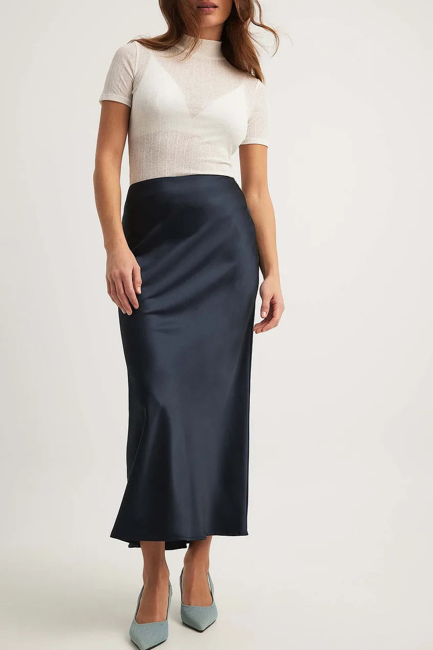 Women's satin midi skirt with straight fit and elastic waistband, front-facing view