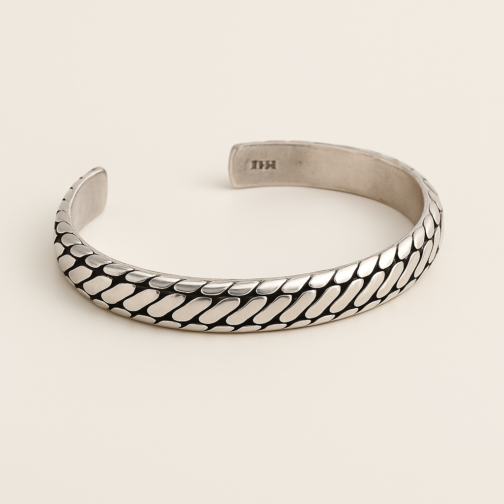 Unisex metal cuff bracelet with textured surface and open adjustable design