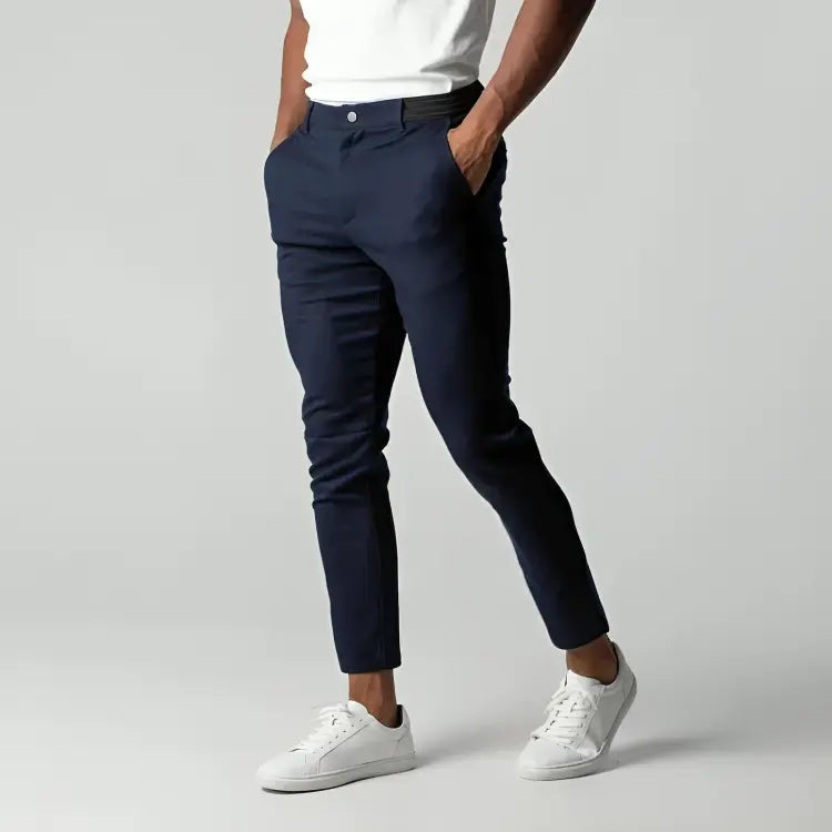 Men's slim fit trousers side view highlighting fitted waist and tapered leg cut