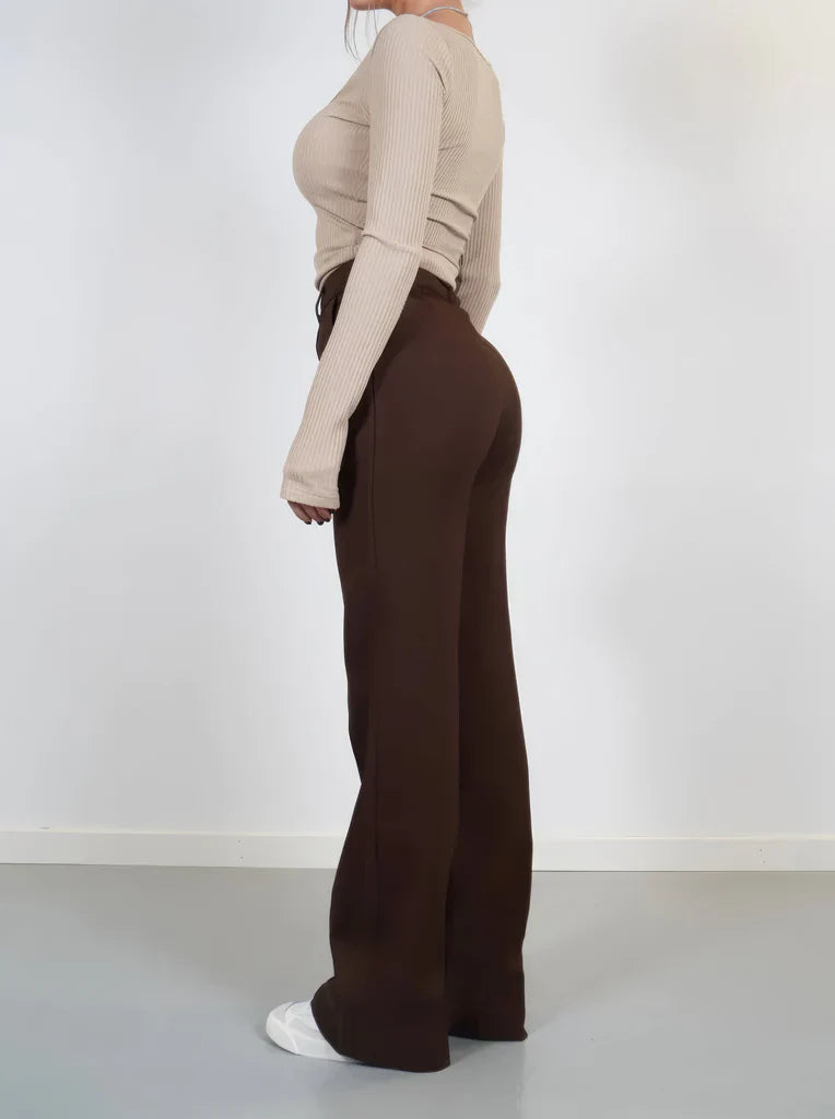 Straight-leg high-waisted trousers for women with a clean, structured front panel