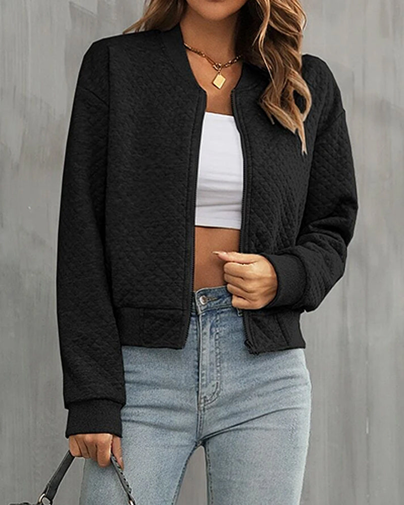 Cropped women's quilted jacket with round neckline and long sleeves