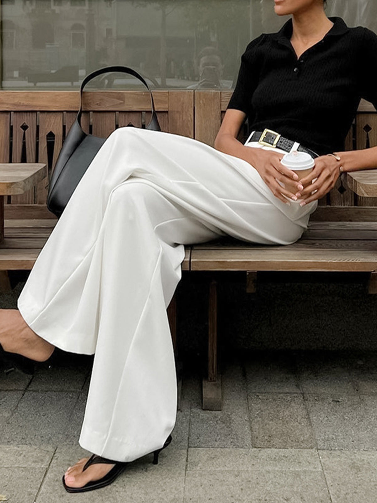 Women's wide-leg trousers showing structured waistband detail