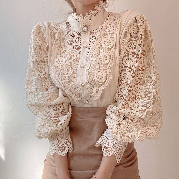 Long-sleeve women's lace blouse featuring a structured high neckline