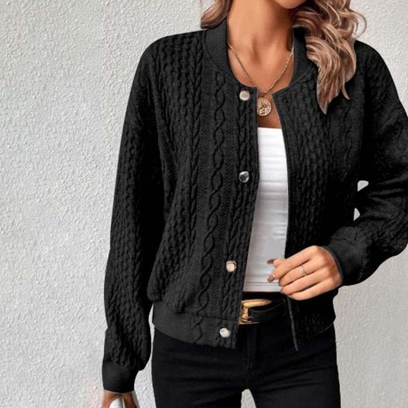 Women's cable knit cardigan layered over everyday outfit with snap button closure