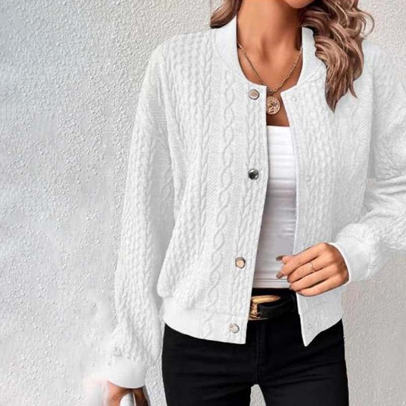 Close-up of cable knit texture and snap buttons on women's knit cardigan