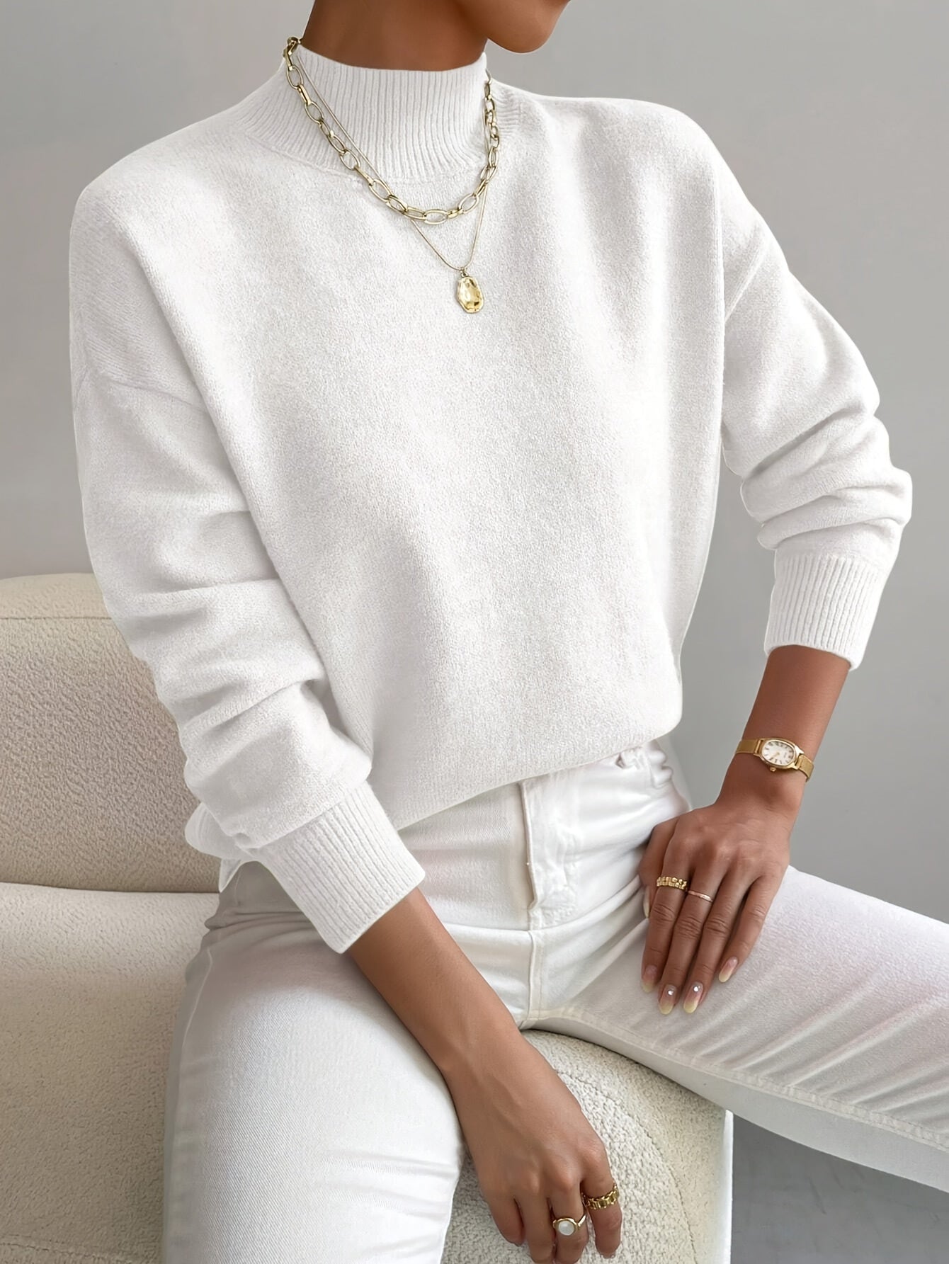 Women's knitted high neck sweater in cotton blend with relaxed fit and ribbed cuffs
