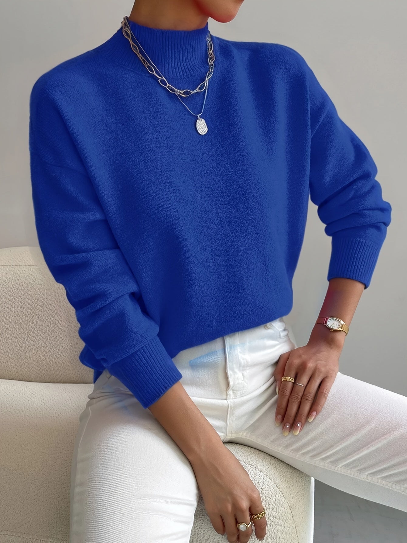 Knitted high neck women's sweater in cotton blend with clean relaxed silhouette
