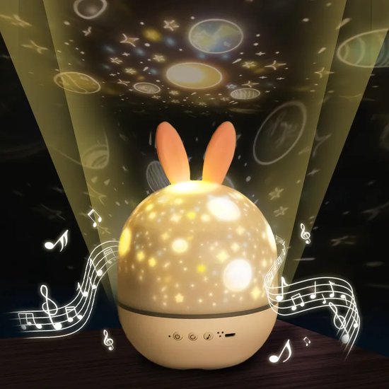 Close-up of kids' star projector dome showing mode and brightness buttons with USB charging port