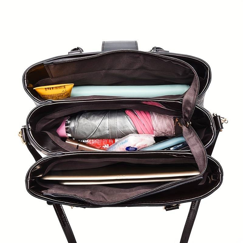 Side view of women's structured handbag with patterned textile and glossy accents
