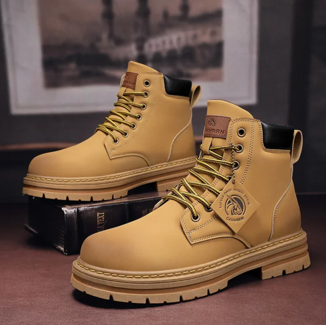 Men's lace-up ankle boots — side profile view highlighting padded collar and rubber outsole
