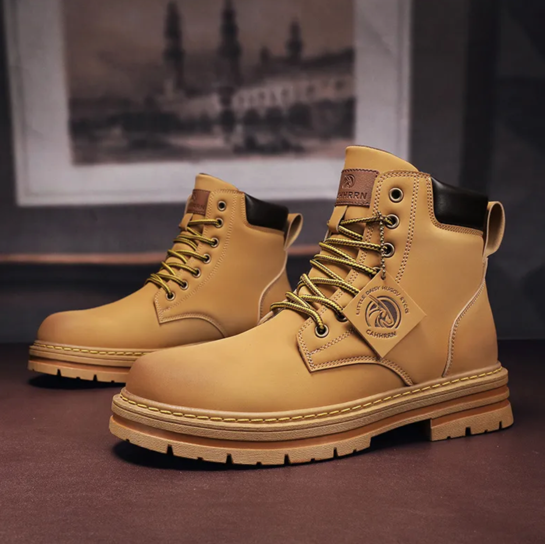 Men's lace-up boots — close-up of rubber outsole showing tread pattern and grip