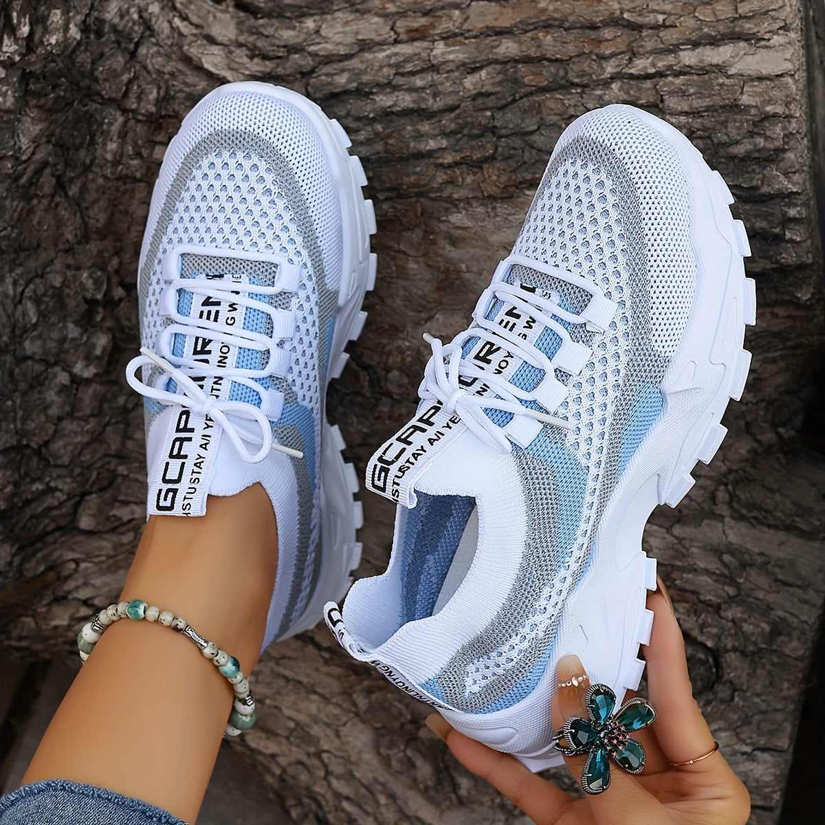 Women's breathable mesh sneakers with elastic sock collar, medial side view