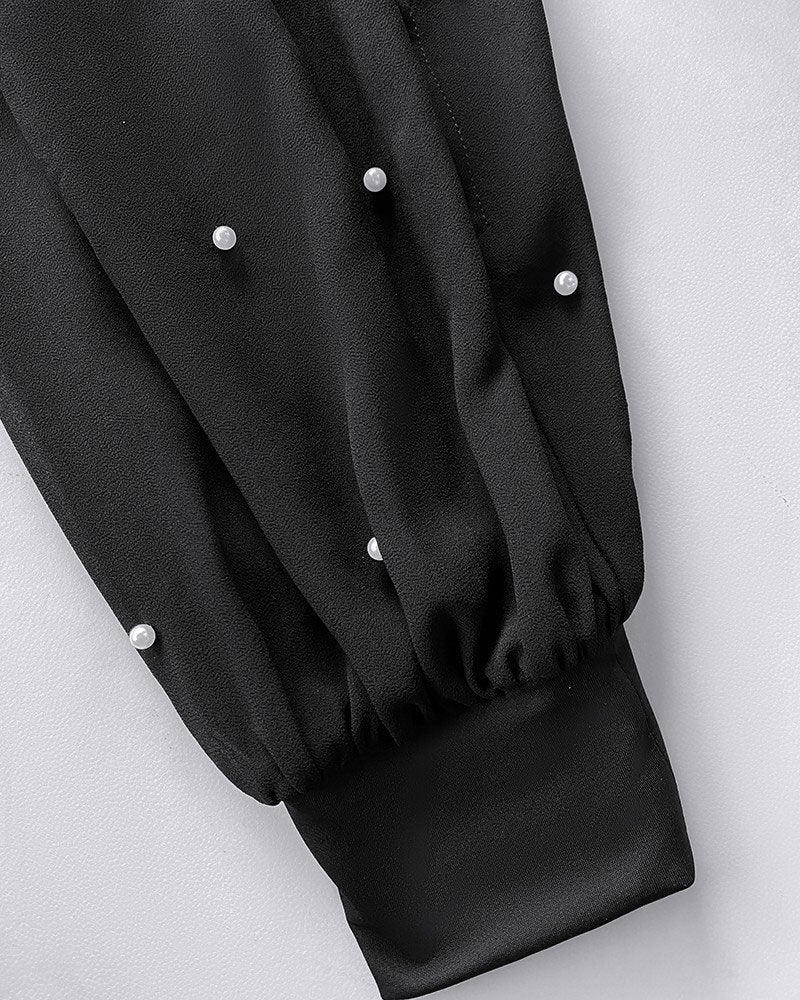 Women's high-neck sheer blouse with decorative details, alternate angle view