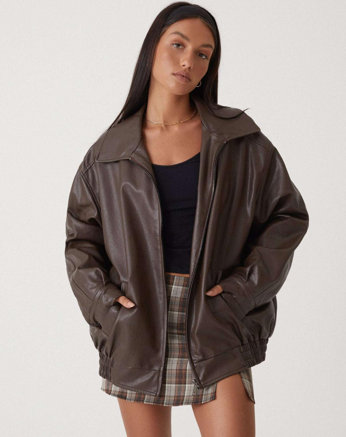 Women's oversized vegan leather jacket with wide turn-down collar and front zipper, front view