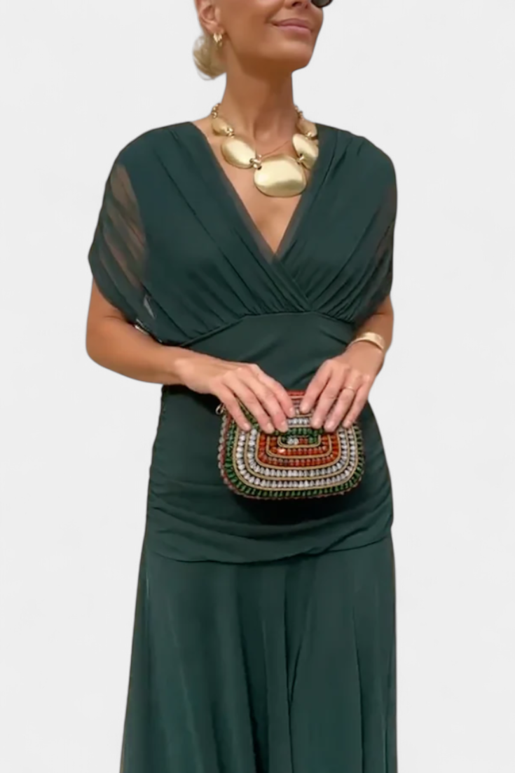 Women's off-shoulder maxi dress with draped waist detail and soft spring silhouette