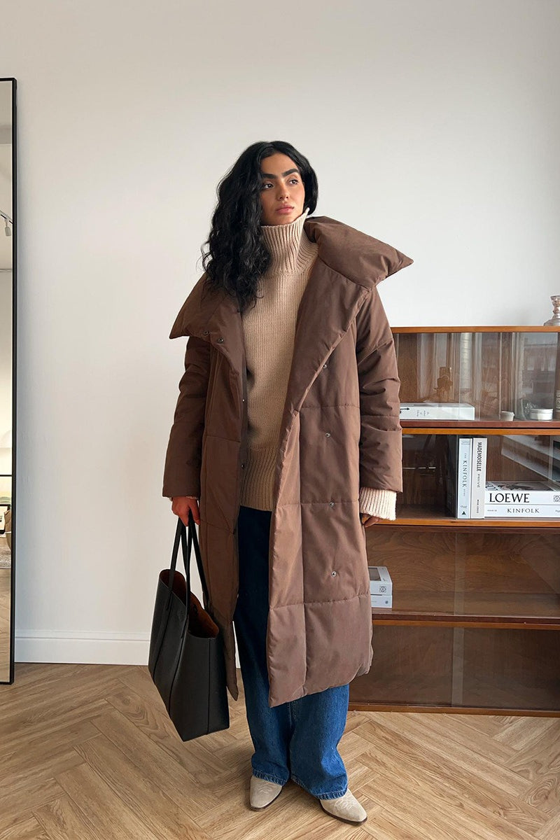 Long padded coat for women with smooth surface finish
