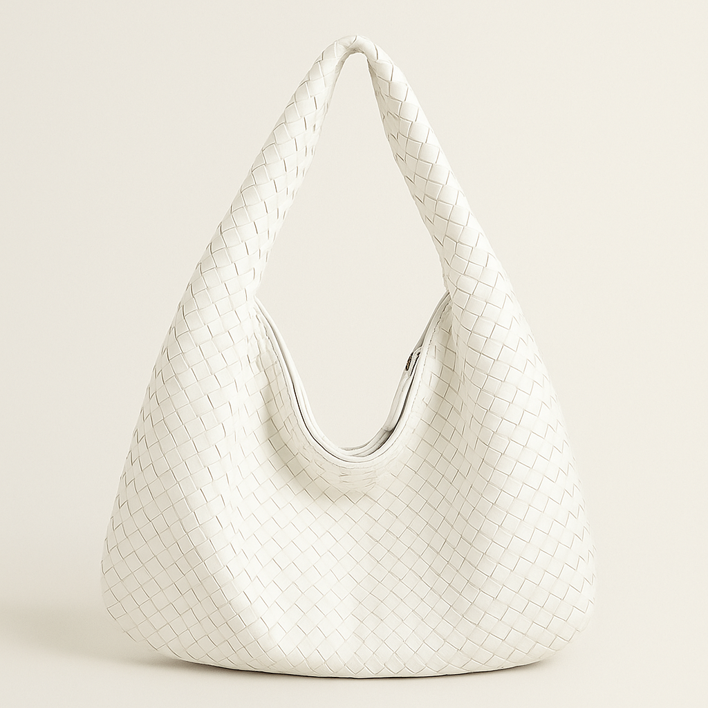 Women's woven faux leather shoulder bag with top zipper closure, front view