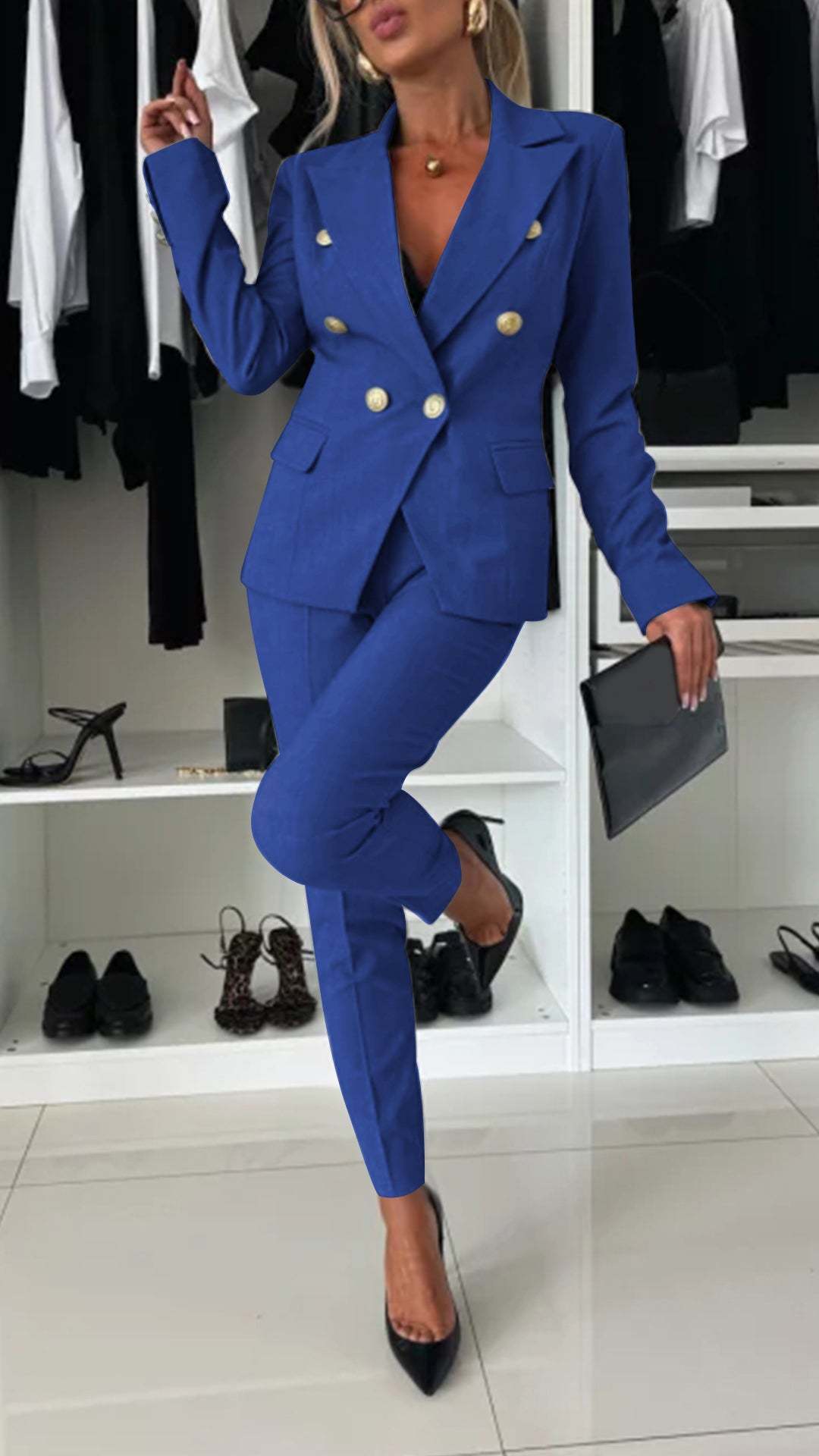 Women's tailored suit set with blazer and slim-fit trousers, side profile view