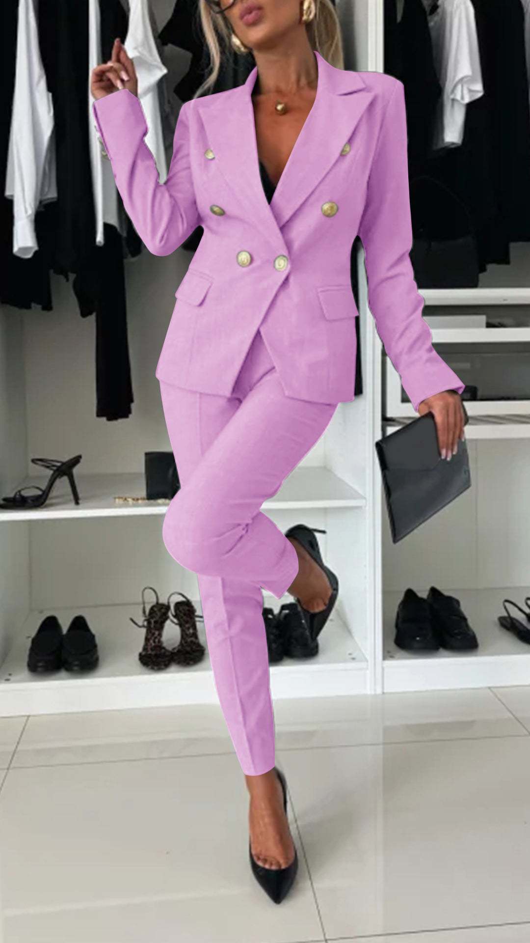 Women's blazer suit set detail showing button closure and woven fabric texture