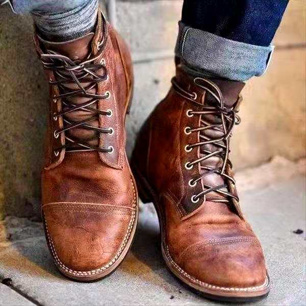 Men's leather lace-up ankle boots with structured toe and visible stitching detail