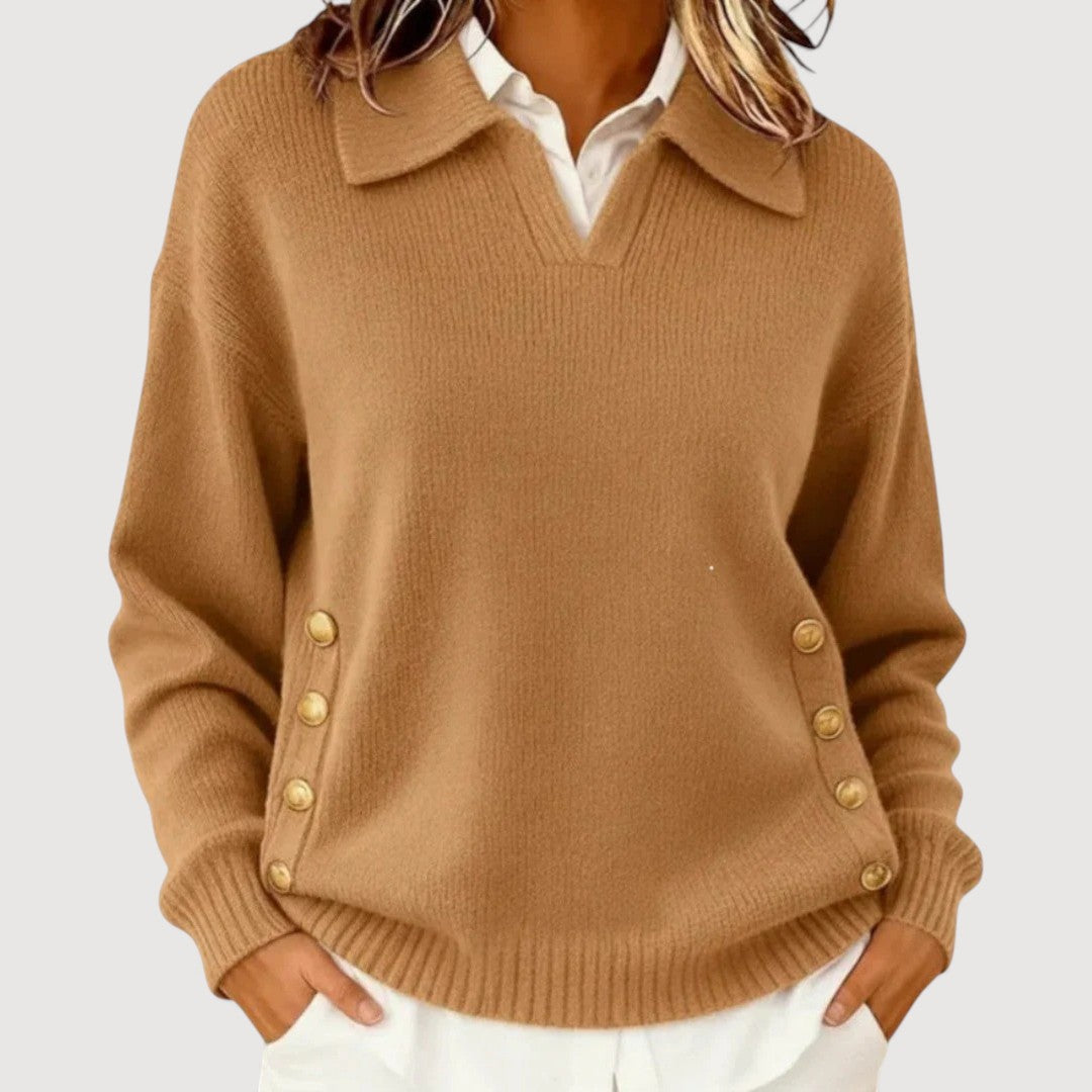Women's knit sweater with decorative button details, V-neckline, ribbed cuffs, and relaxed fit