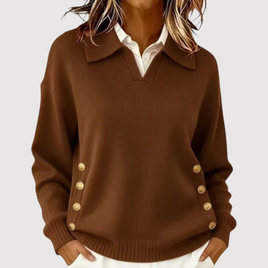 Women's relaxed-fit knit sweater featuring side button details and ribbed hem