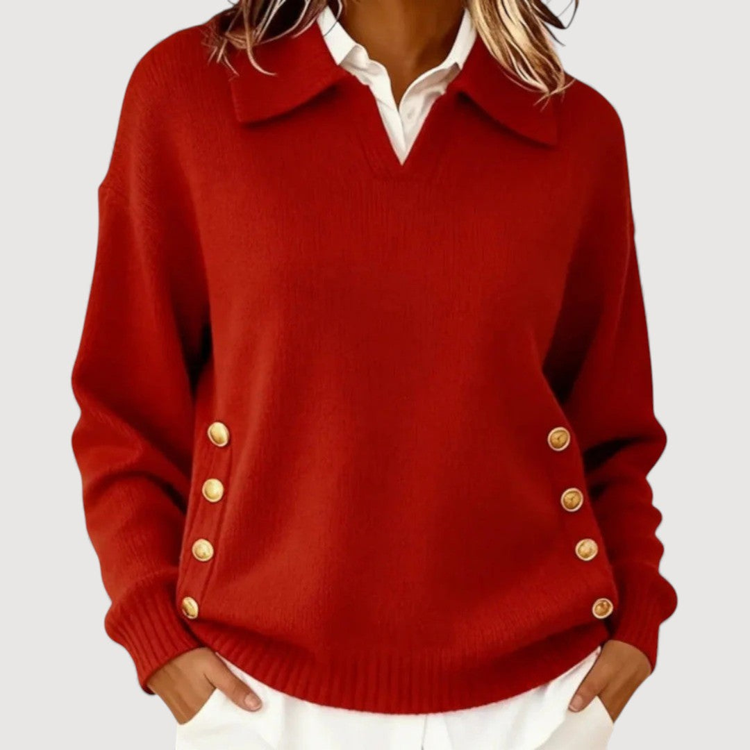 Women's knit sweater with side button details, long sleeves, and ribbed hem