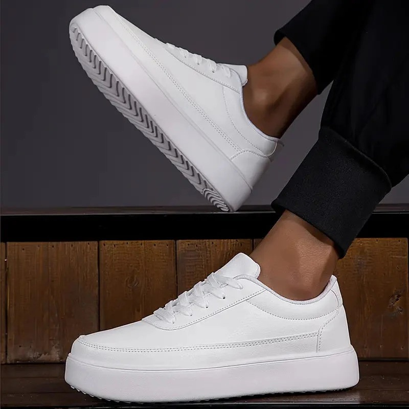 White lace-up sneakers for men with clean silhouette, angled three-quarter view