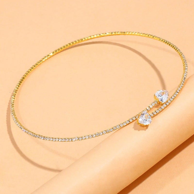 Women's metal choker necklace with zirconia stone elements and clasp closure