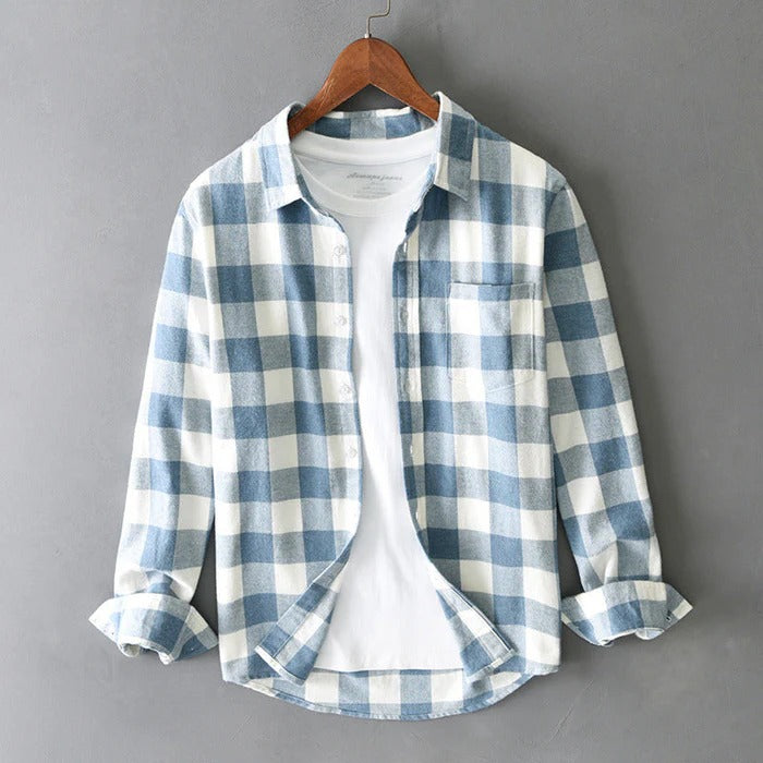 Men's plaid shirt with button closure, classic collar, chest pocket, and long sleeves